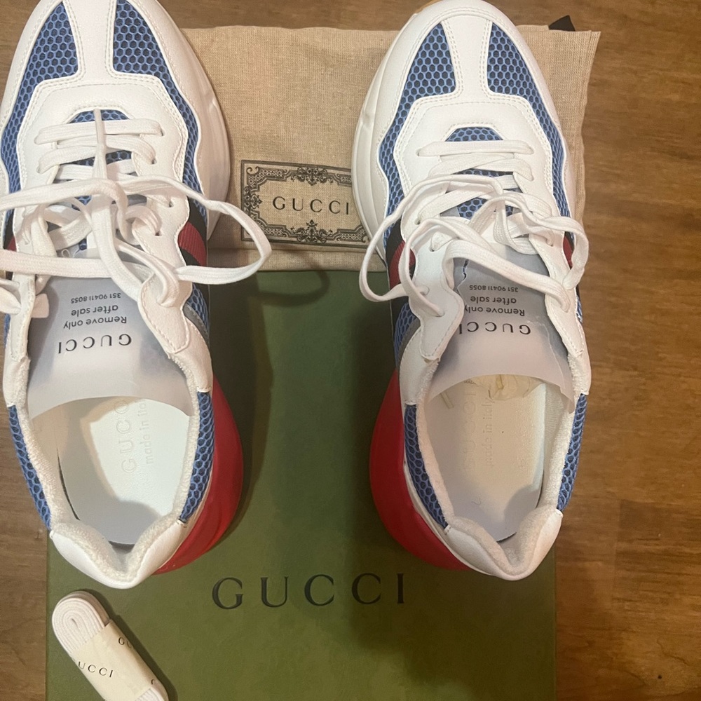 Brand new authentic Gucci sneakers.    Men’s size 7.